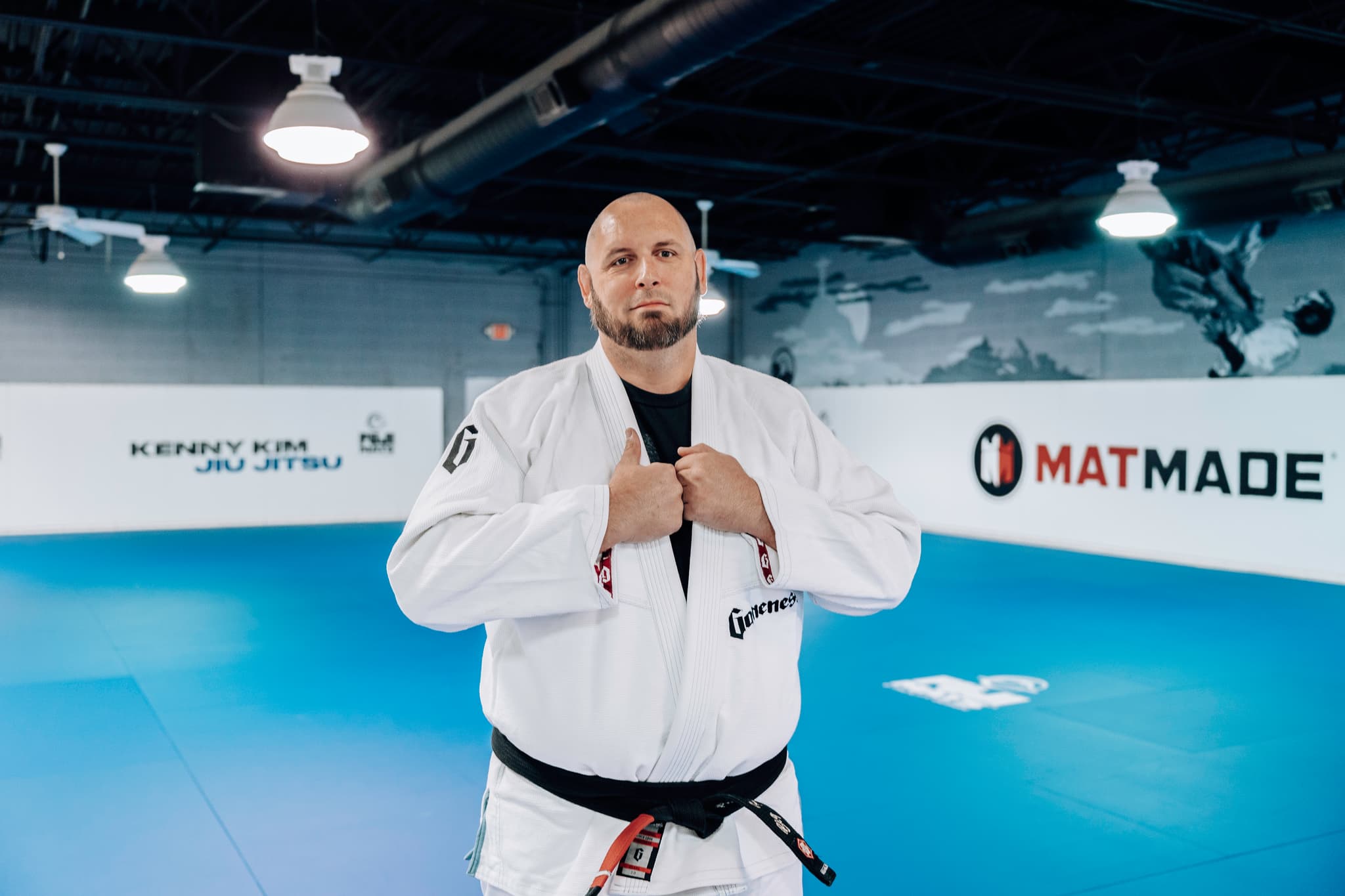 Kenny Seger standing on the mats at Kenny Kim Brazilian Jiu Jitsu in Marietta GA