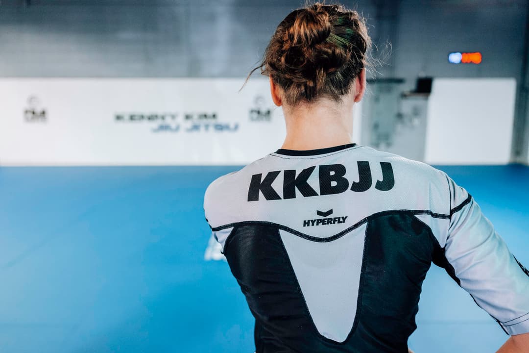 Brazilian Jiu Jitsu teenager at Kenny Kim BJJ in Marietta GA wearing her KKBJJ shirt