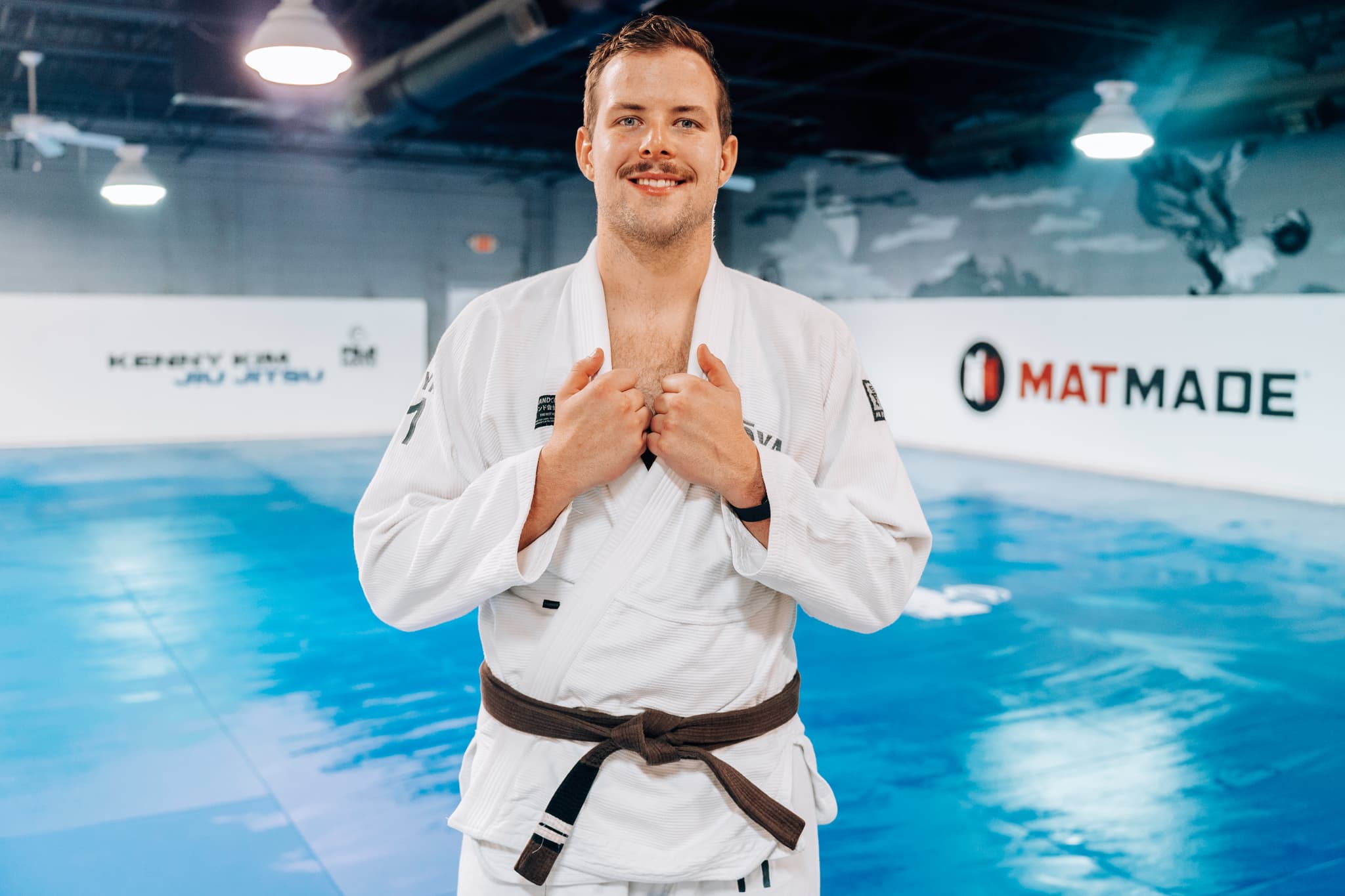 Michael Barger standing on the mats at Kenny Kim Brazilian Jiu Jitsu in Marietta GA